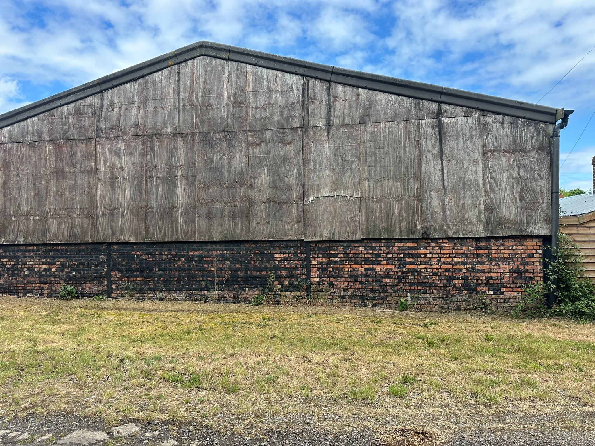Before weathered timber barn cladding